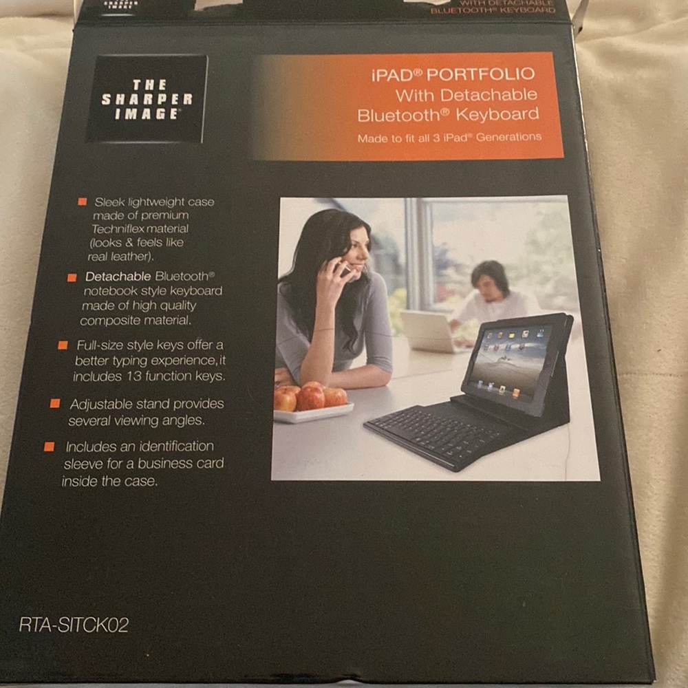 The Sharper Image iPad portfolio with detachable Bluetooth keyboard.